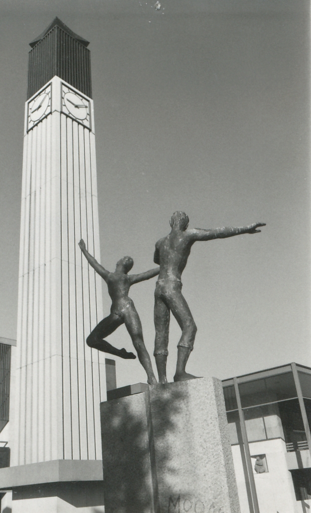 Dancing figures statue and Clock Tower
