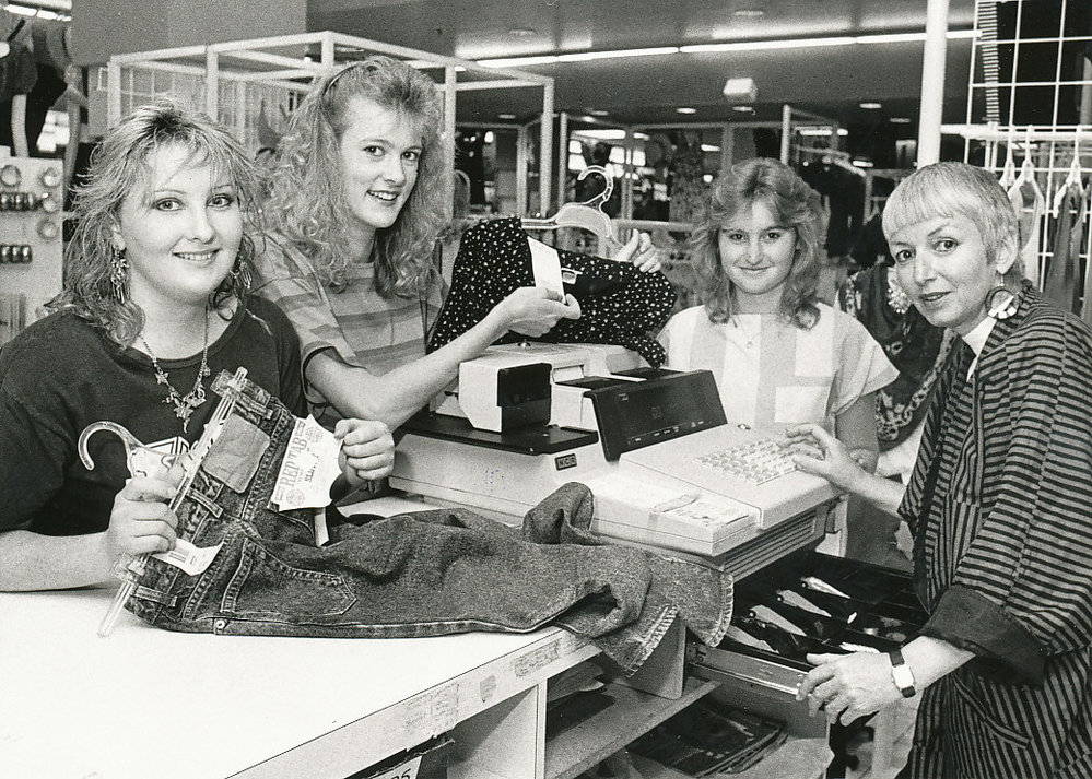Showing the operation of the cash register at John Martin's Elizabeth