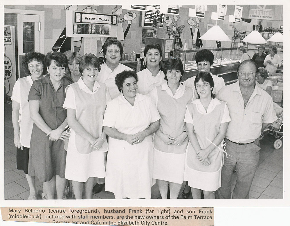 Belperio family and staff in the Palm Terrace Restaurant and Cafe