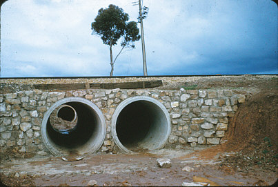 Water pipes beneath Elizabeth Railway line :1958