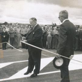 Max Fatchen cutting ribbon