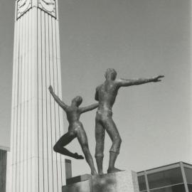 Dancing figures statue and Clock Tower